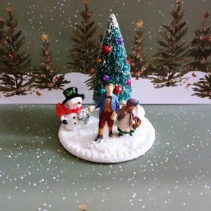 Dept 56 Vintage Young boy and girl strolling in the snow with a Christmas tree